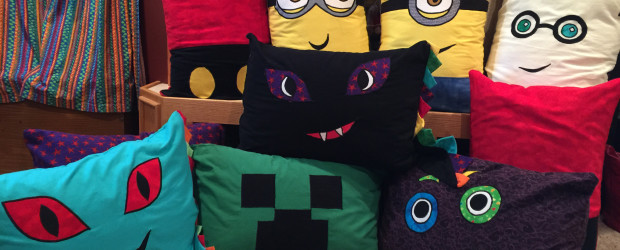 We dropped off some Reading Pillows for the little guy's classroom today. This year's assortment includes Harry Potter, dragons, monsters, Minions, Mickey Mouse and a Minecraft Creeper. (=